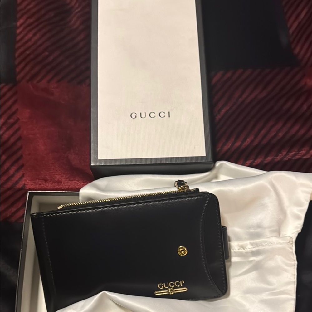 Gucci Black Wallet with Gold Accents. Very unique wallet with money clip.